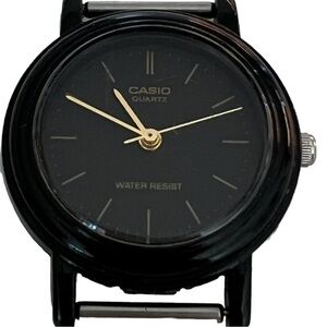 Casio Black Watch Face Gold arms Water Resistant